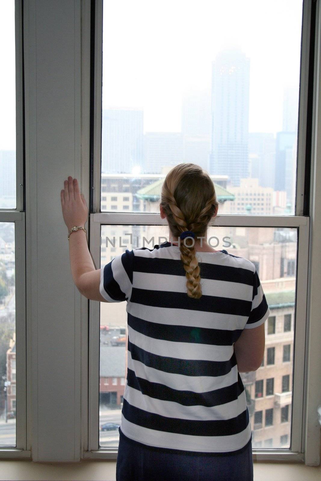 Woman looking over the Atlanta Skyline by mahnken