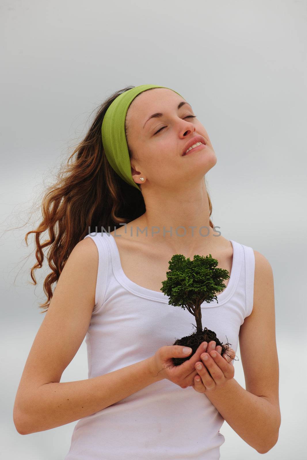 spiritual woman planting a flower