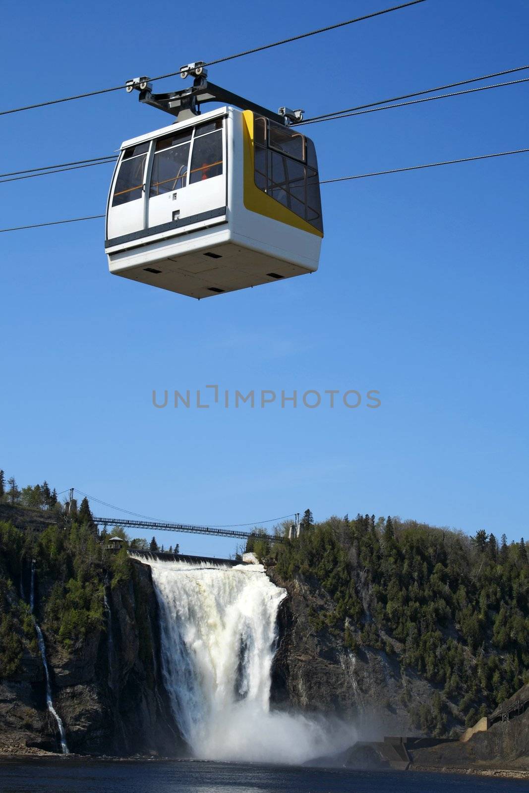 Cable car going up to the waterfall on the mountain.