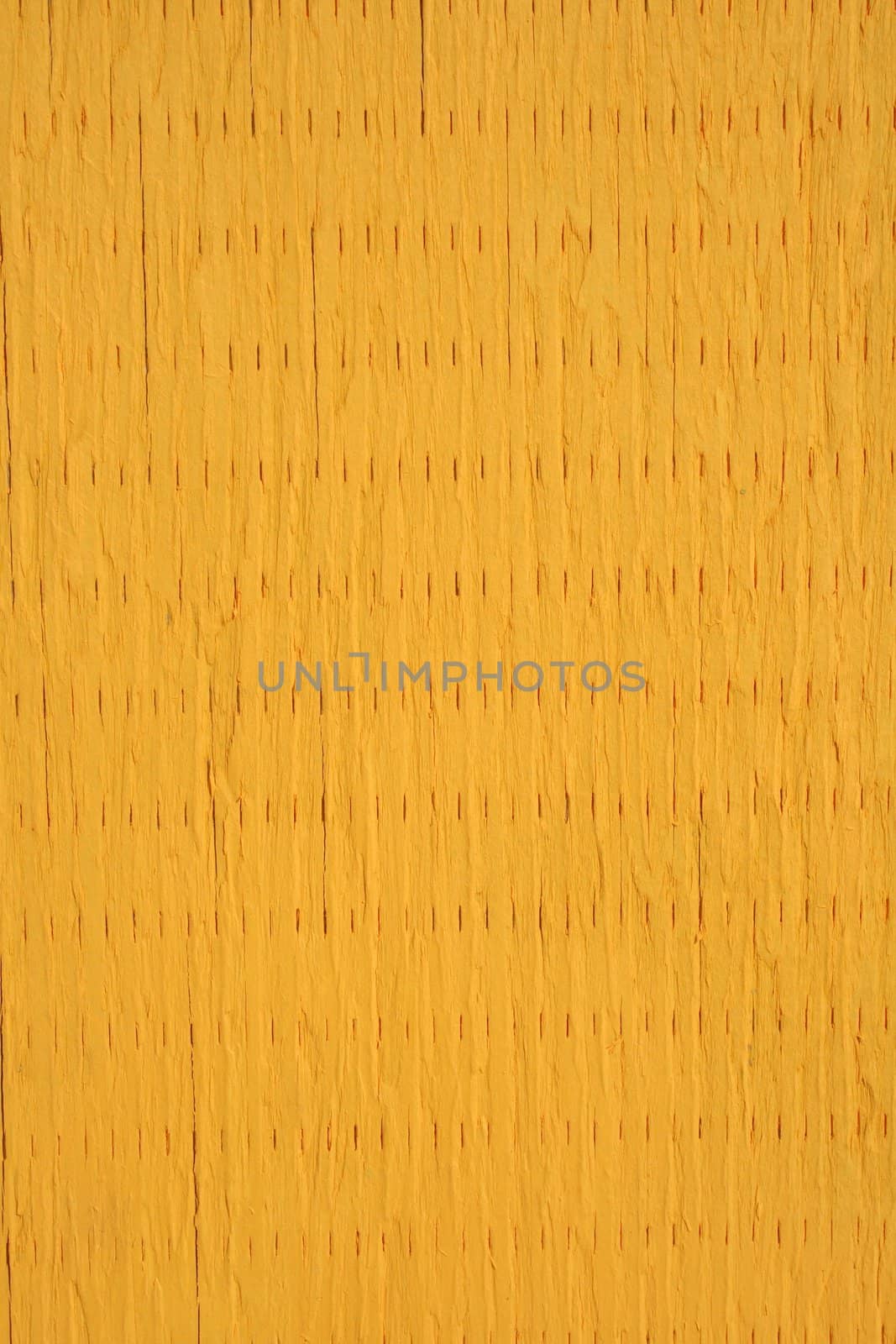 Painted wooden texture of vibrant yellow color