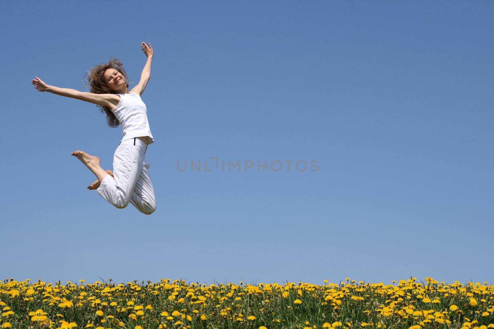 Smiling pretty woman in a beautiful jump.
