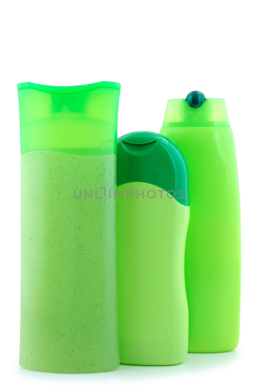Three different  green beauty and hygiene products. On overwhite background.