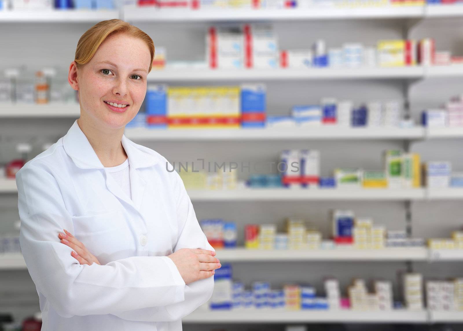 portrait of a female pharmacist at pharmacy