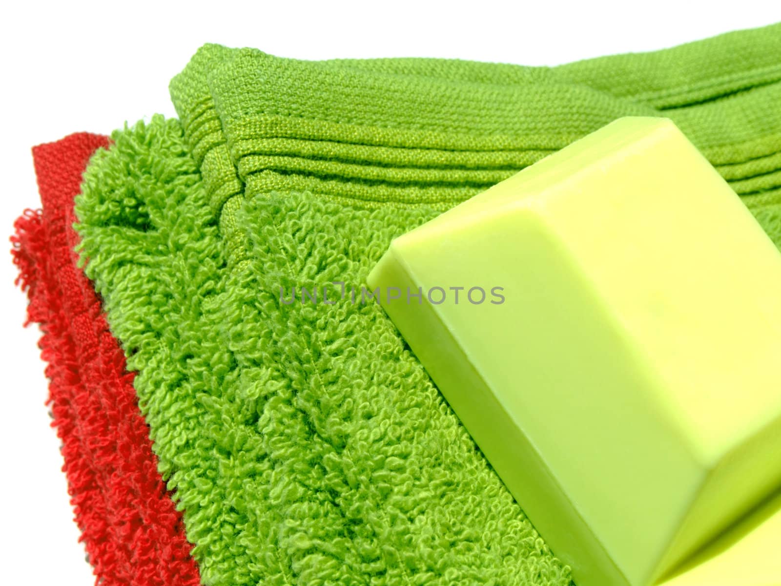 Two towels and a piece of soap