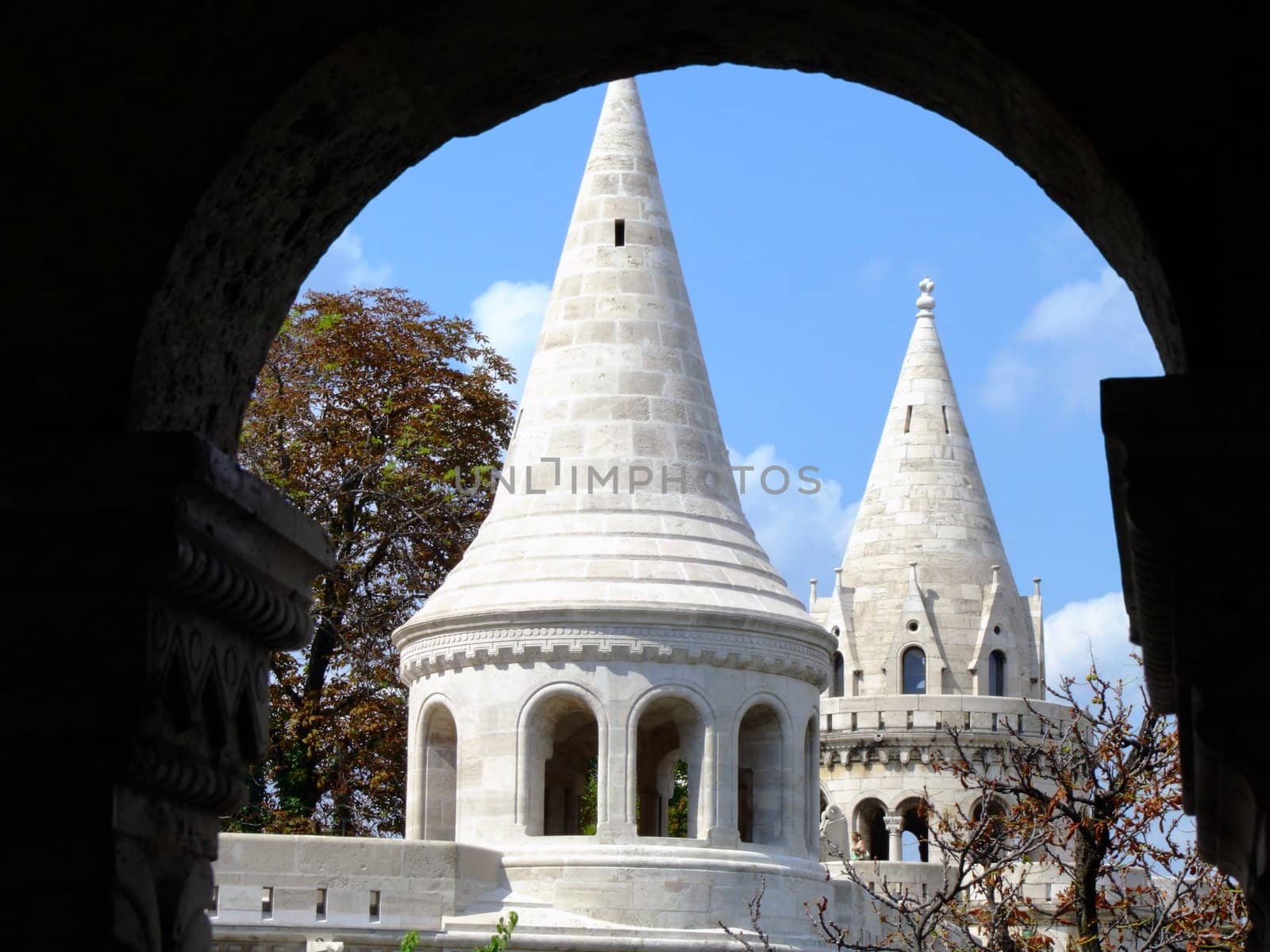 Fishermen Bastion is a terrace in neo-Gothic and neo-Romanesque style situated on the Buda bank of the Danube, on the Castle hill in Budapest, around Matthias Church. It was designed and built between 1895 and 1902 on the plans of Frigyes Schulek. Its seven towers represent the seven Magyar tribes that settled in the Carpathian Basin in 896.
The Bastion takes its name from the guild of fishermen which was responsible for defending this stretch of the city walls in the Middle Ages. It is a viewing terrace, with many stairs and walking paths.