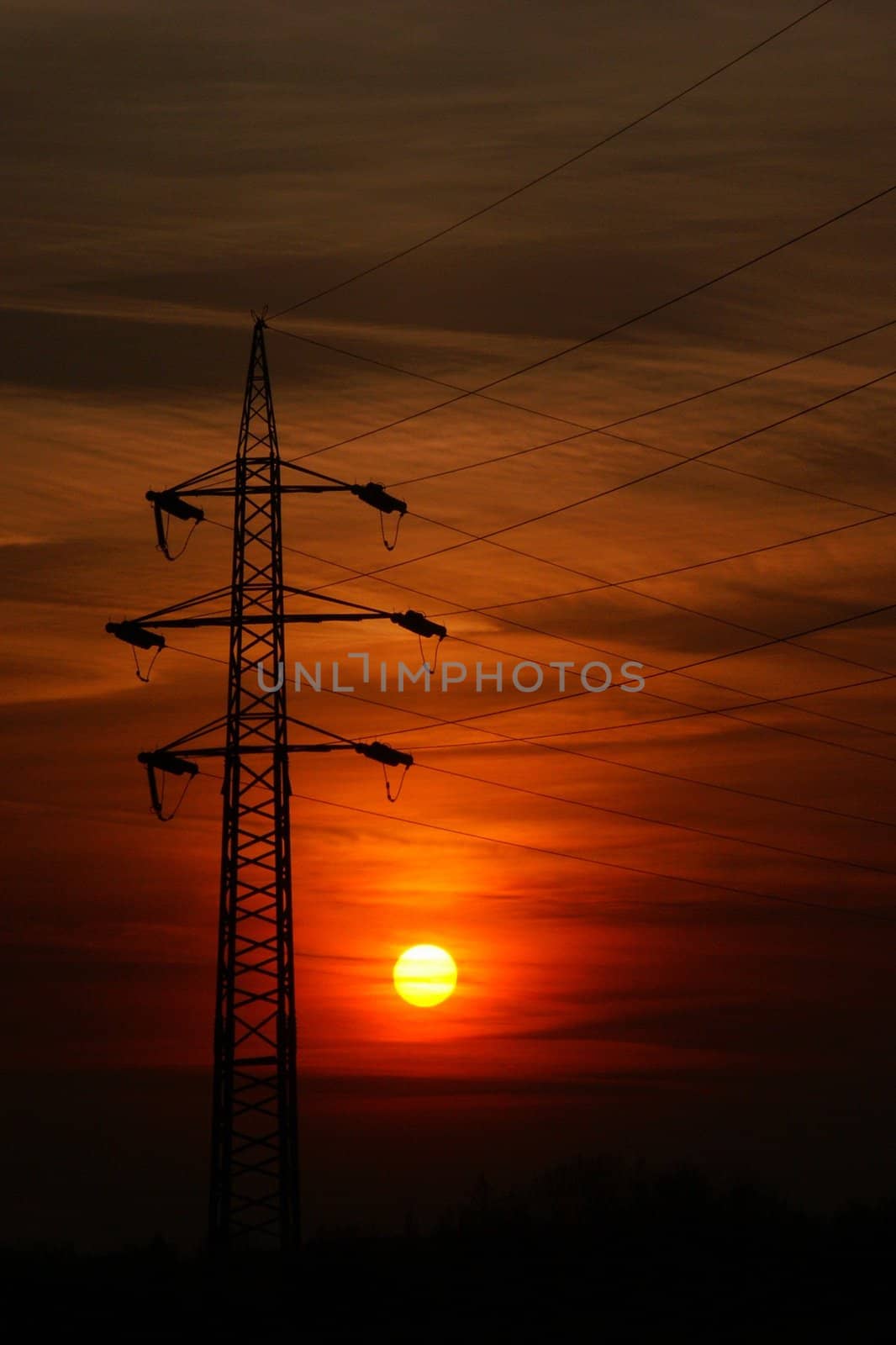 sunset beyond high pylon, vertically framed shot, vertical