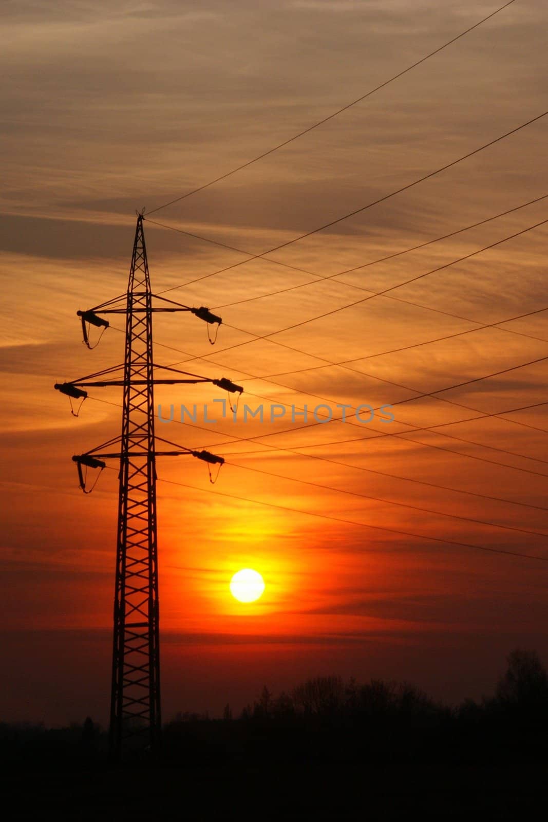 sunset beyond high pylon, vertically framed shot, vertical