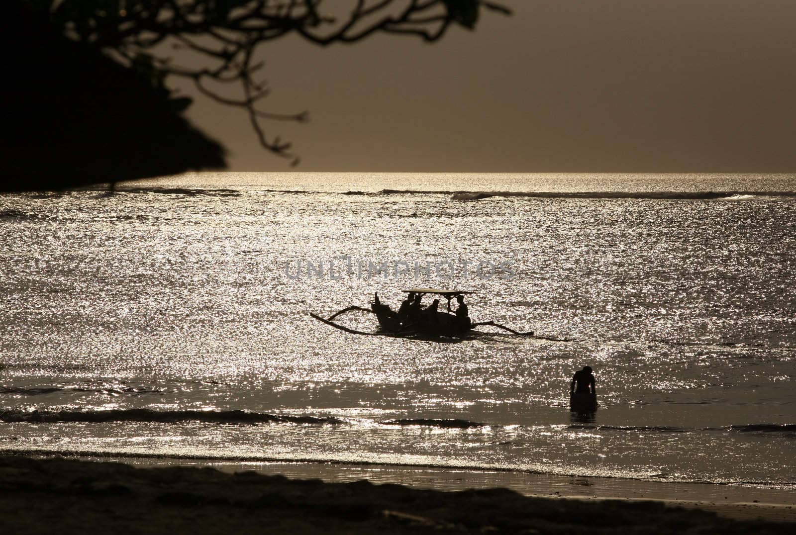 Sailing with a beautiful sunset in a tropical place