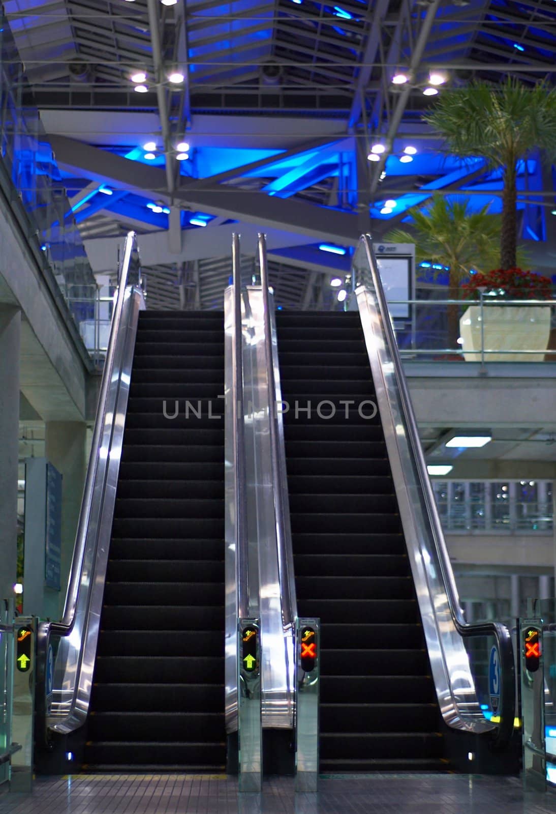 Escalator. Abstract metal construction. Interior of modern building. 