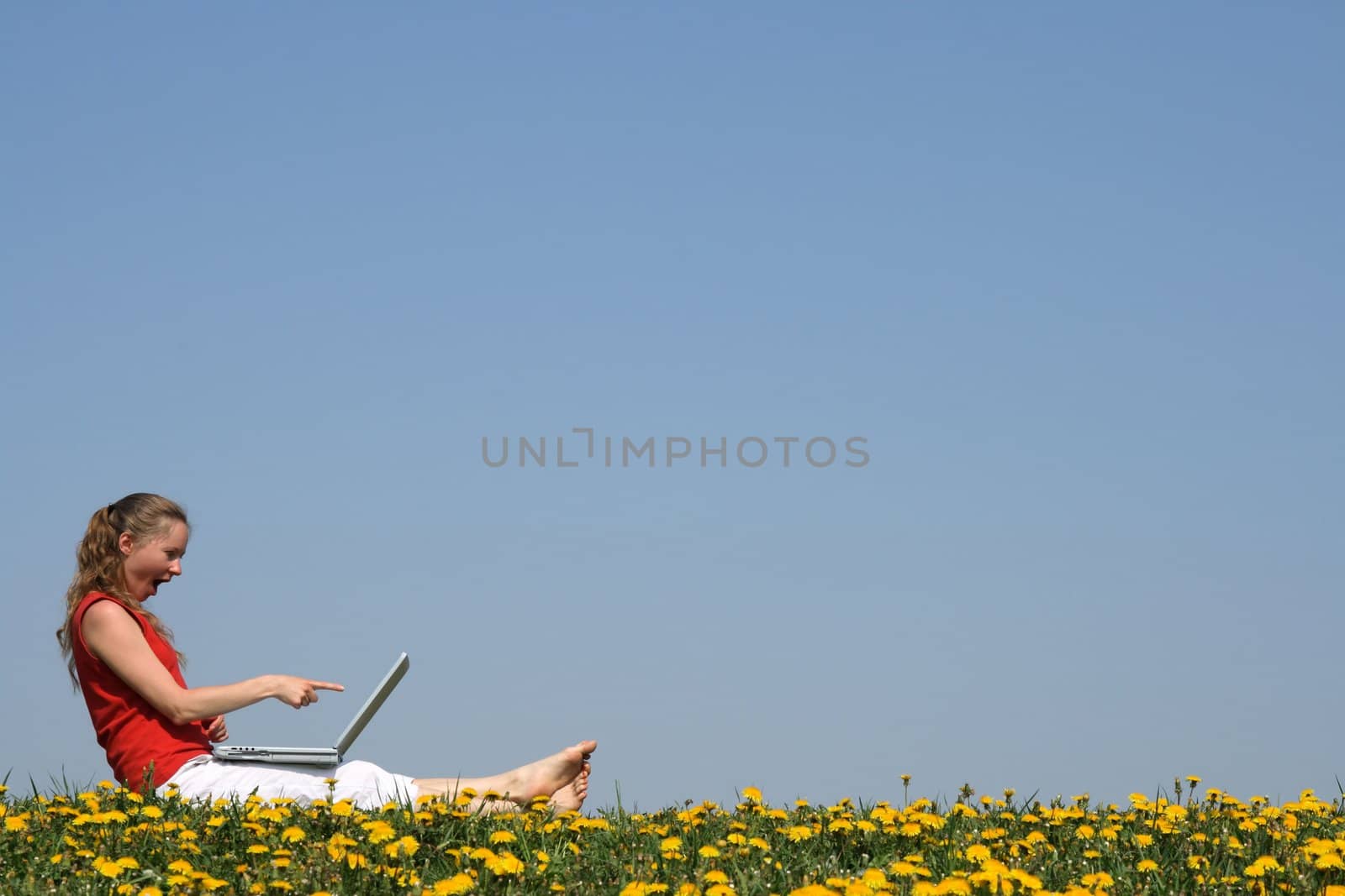 Surprised girl with laptop by anikasalsera