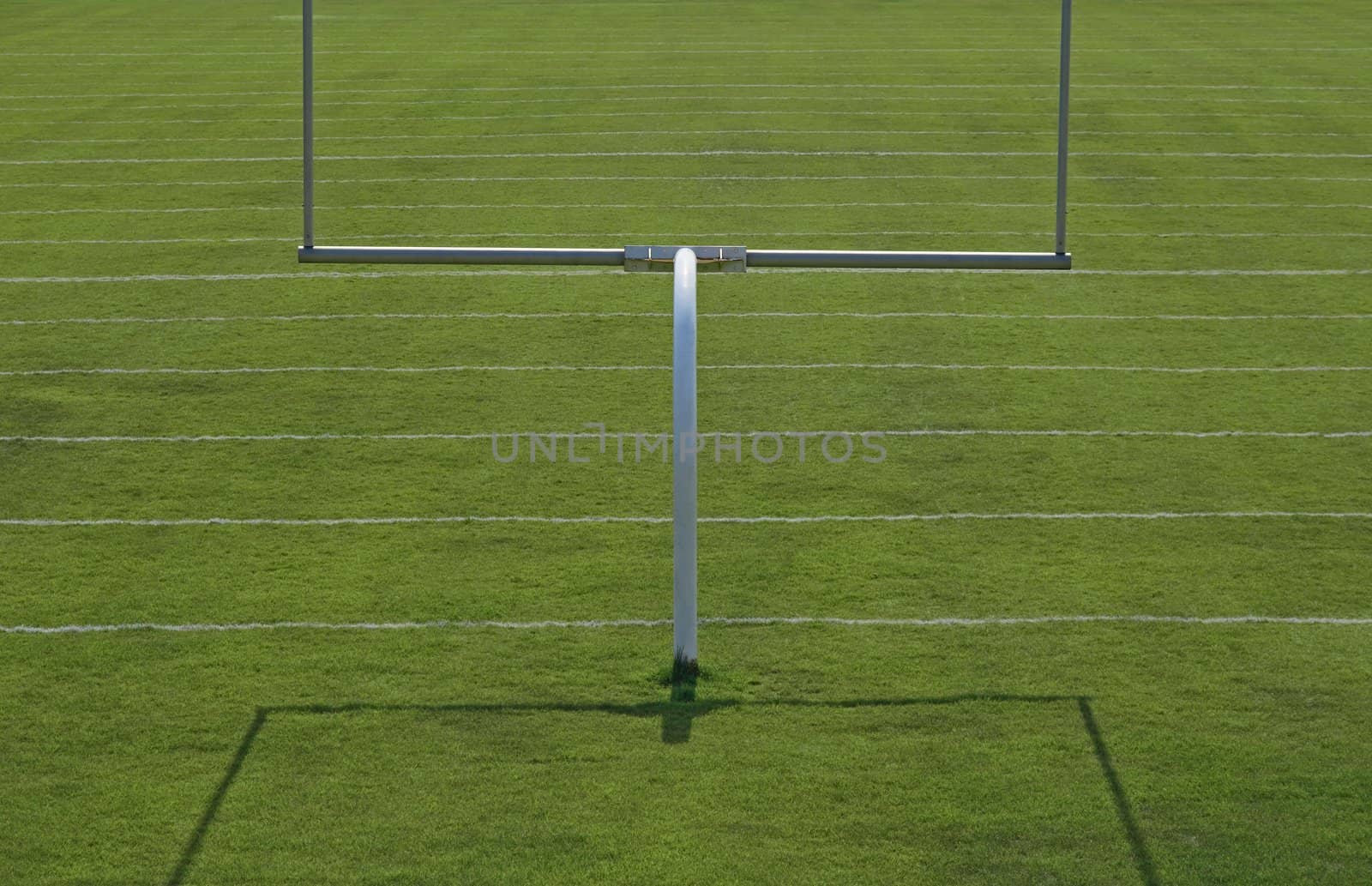 American football playing field with goal posts.