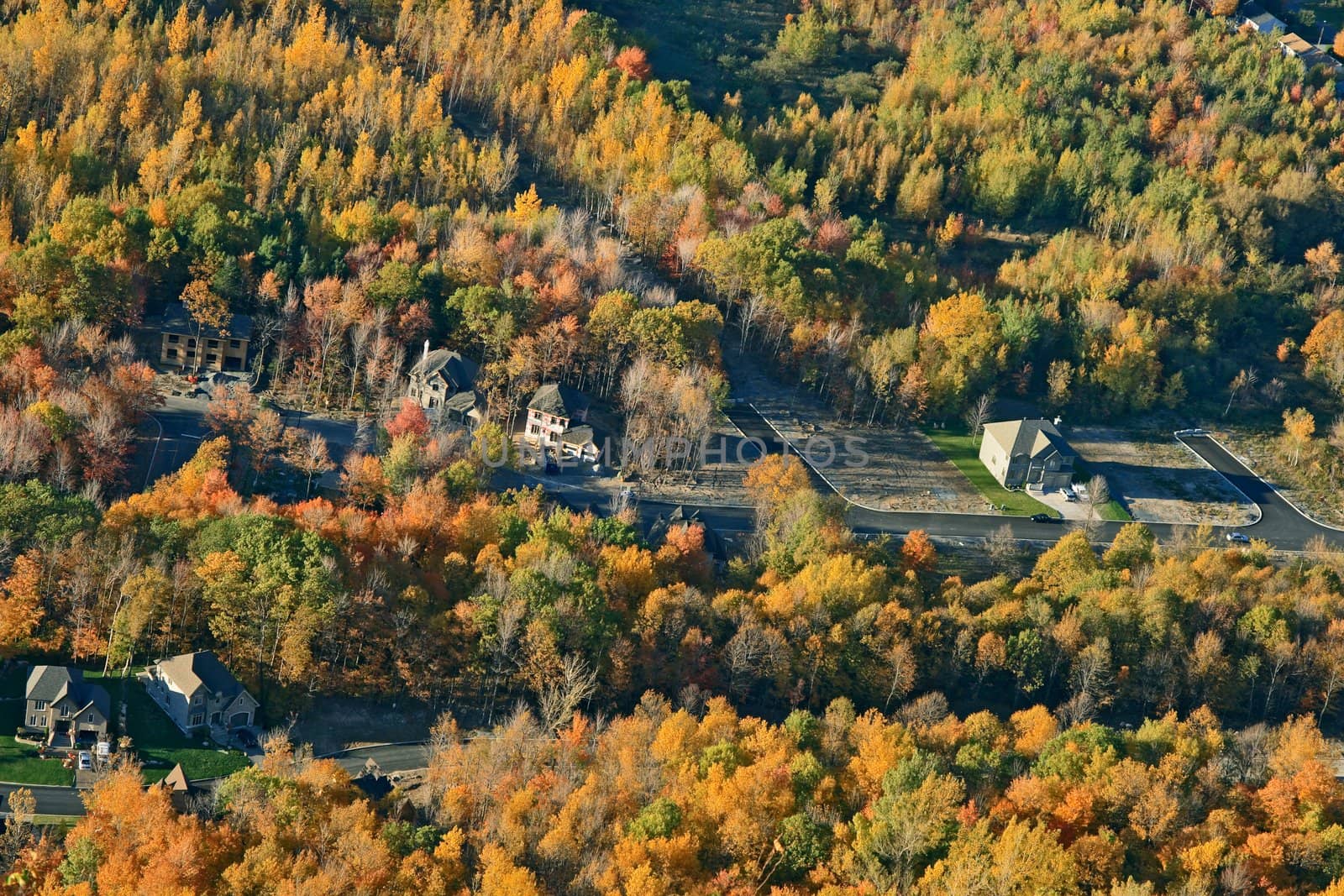 View of a newly constructed suburban district in bright colors of autumn.