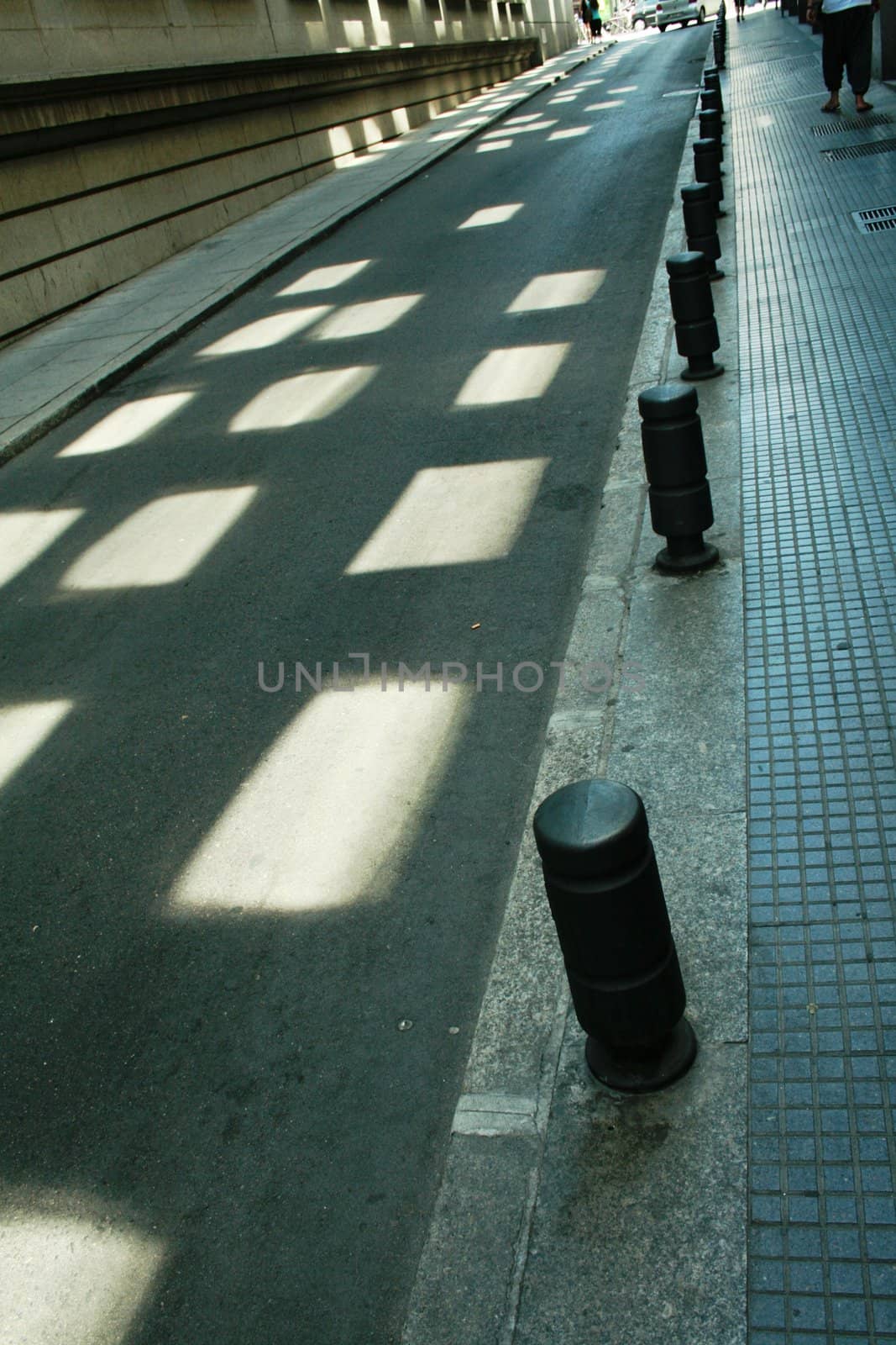 Reflected light from windows in the street of Madrid
