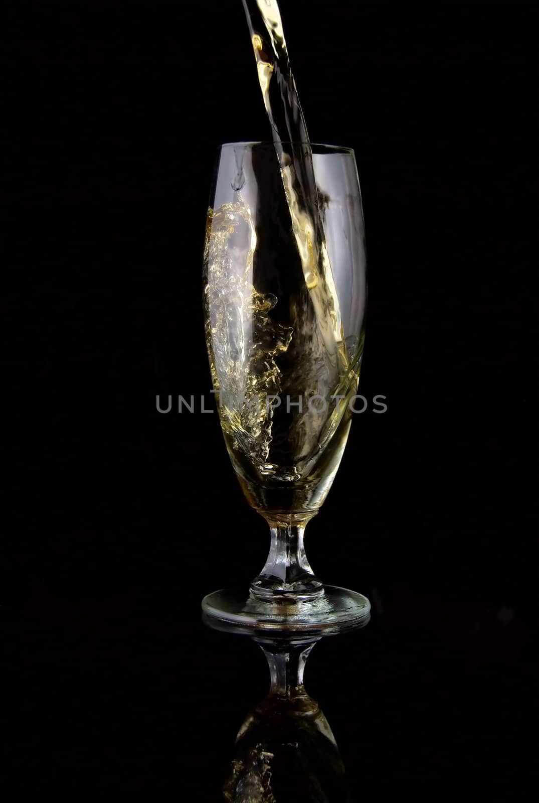 glass of wine poured