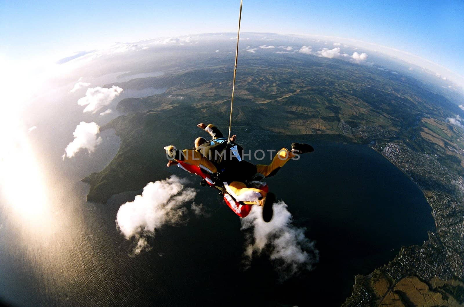 Tandem skydiver in action parachuting.