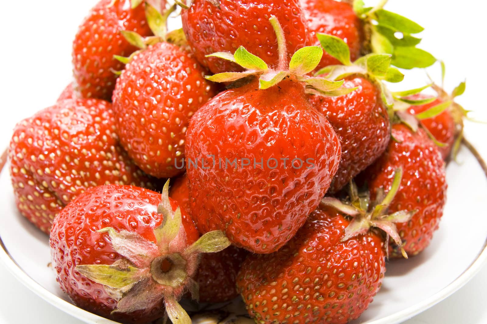 Close up of a strawberry isolated on white background