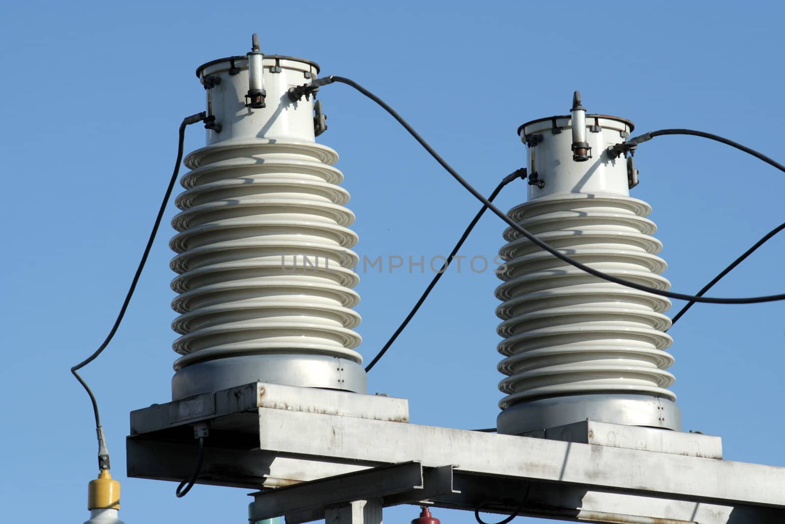 Two big insulators on the high-voltage substation