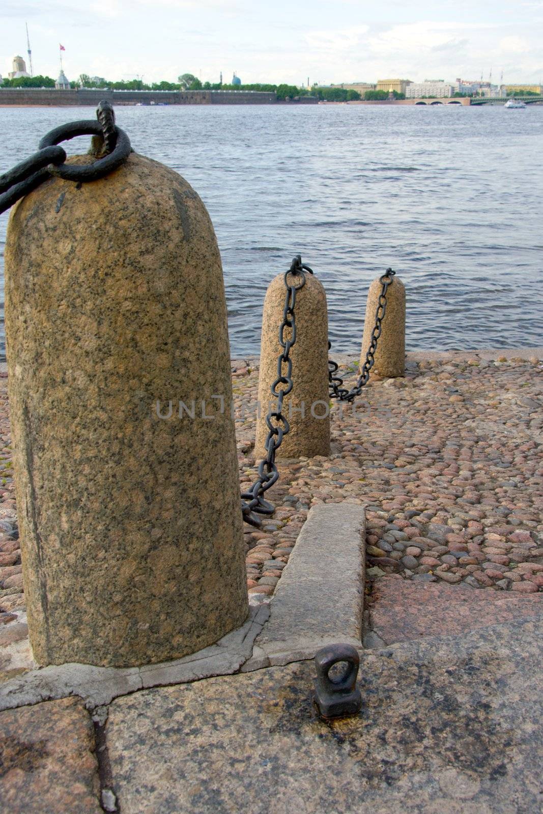 Granite river embankment with wharf chain in Saint-Petersburg
