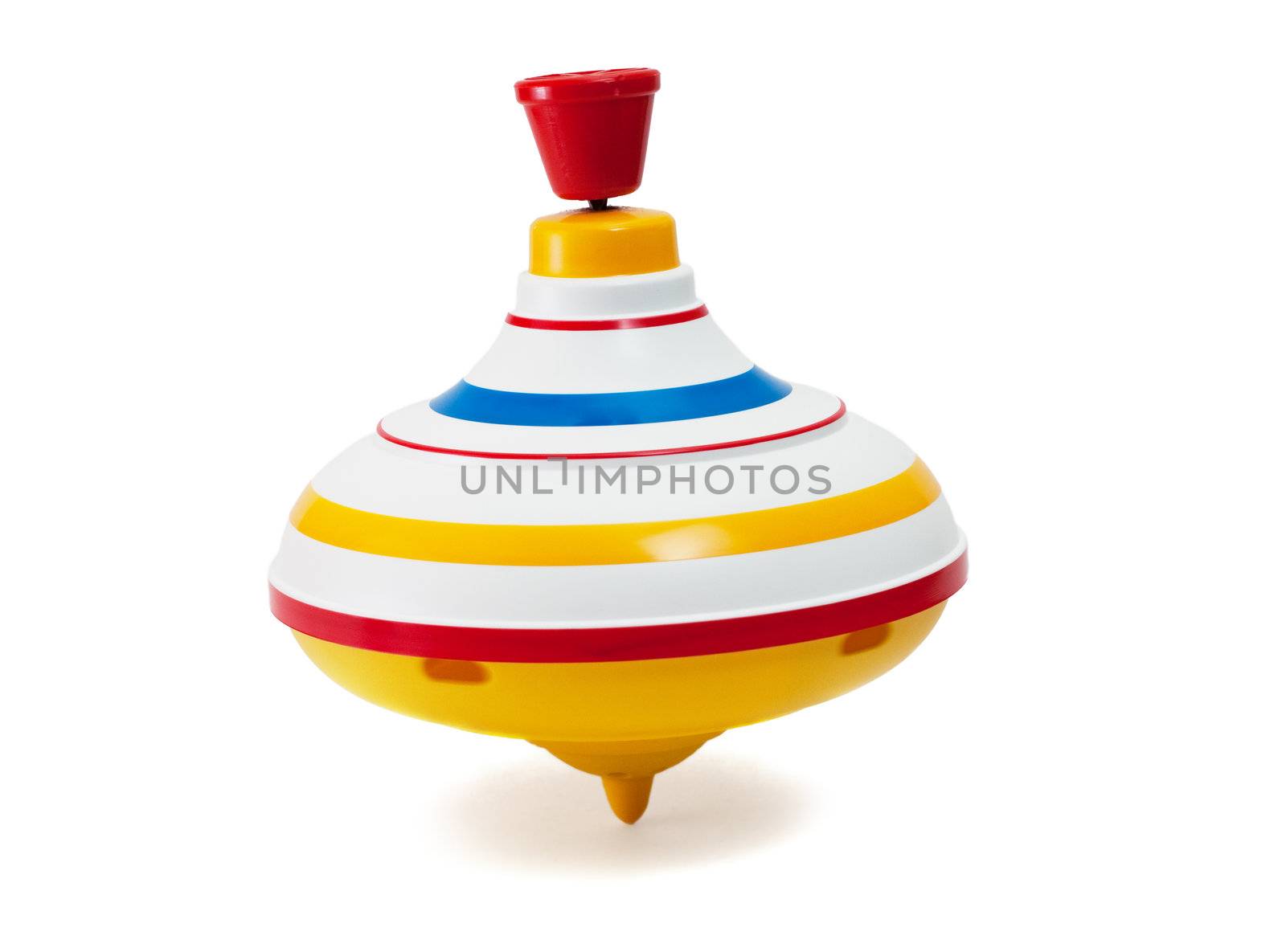 Old-fashioned revolvable whirligig isolated on white. Children`s toy.