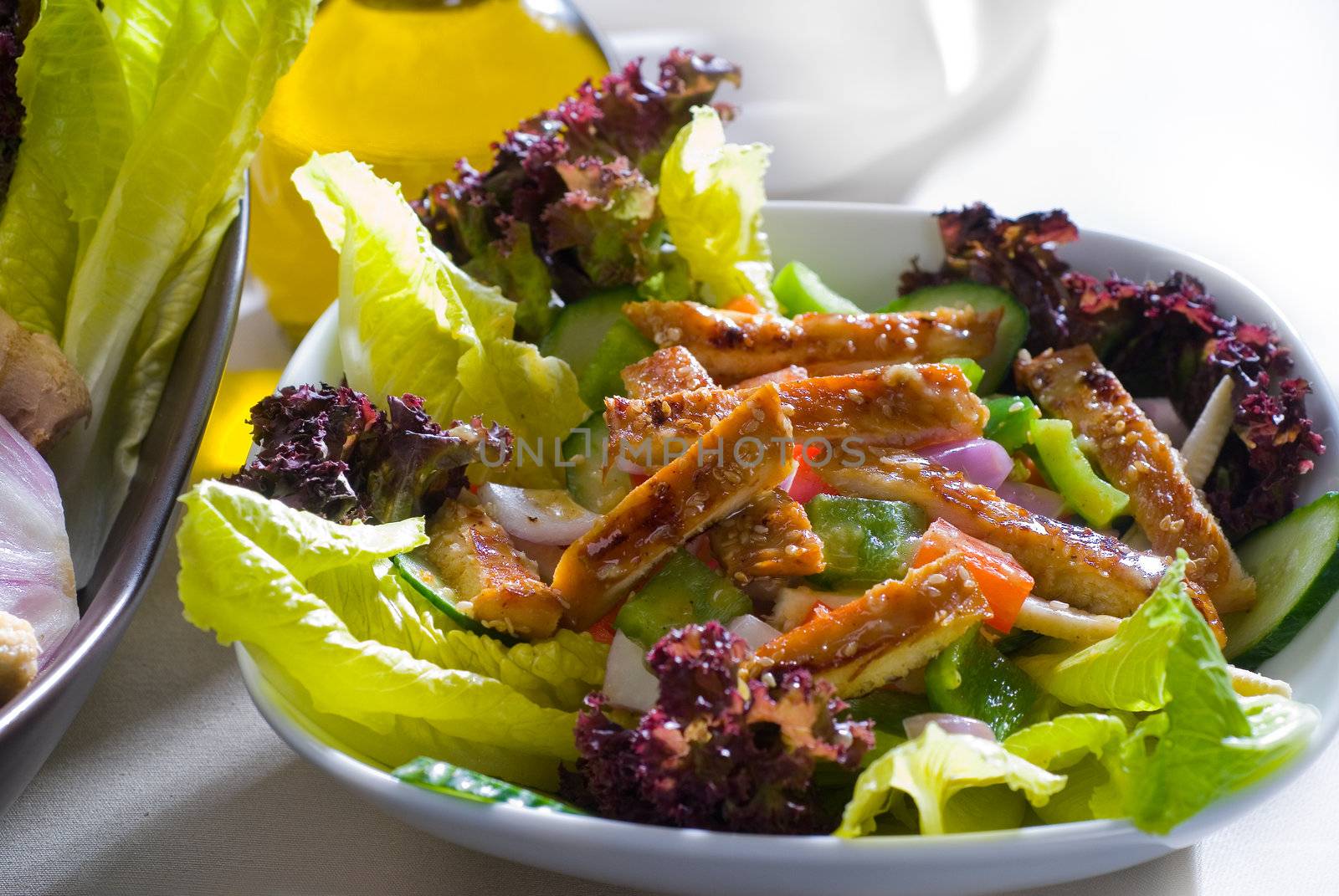 fresh colorfull sesame chicken salad close up