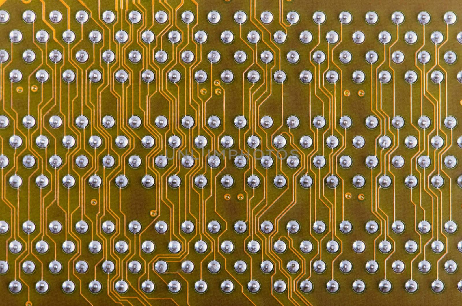 Industrial electronic yellow background of the computer motherboard