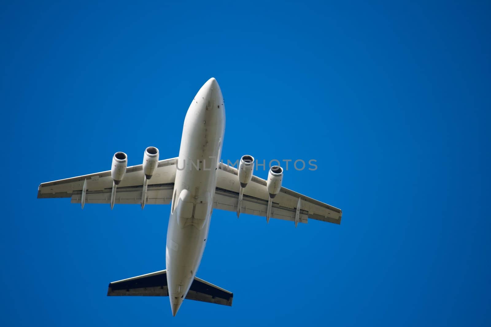 Jet airliner against blue sky