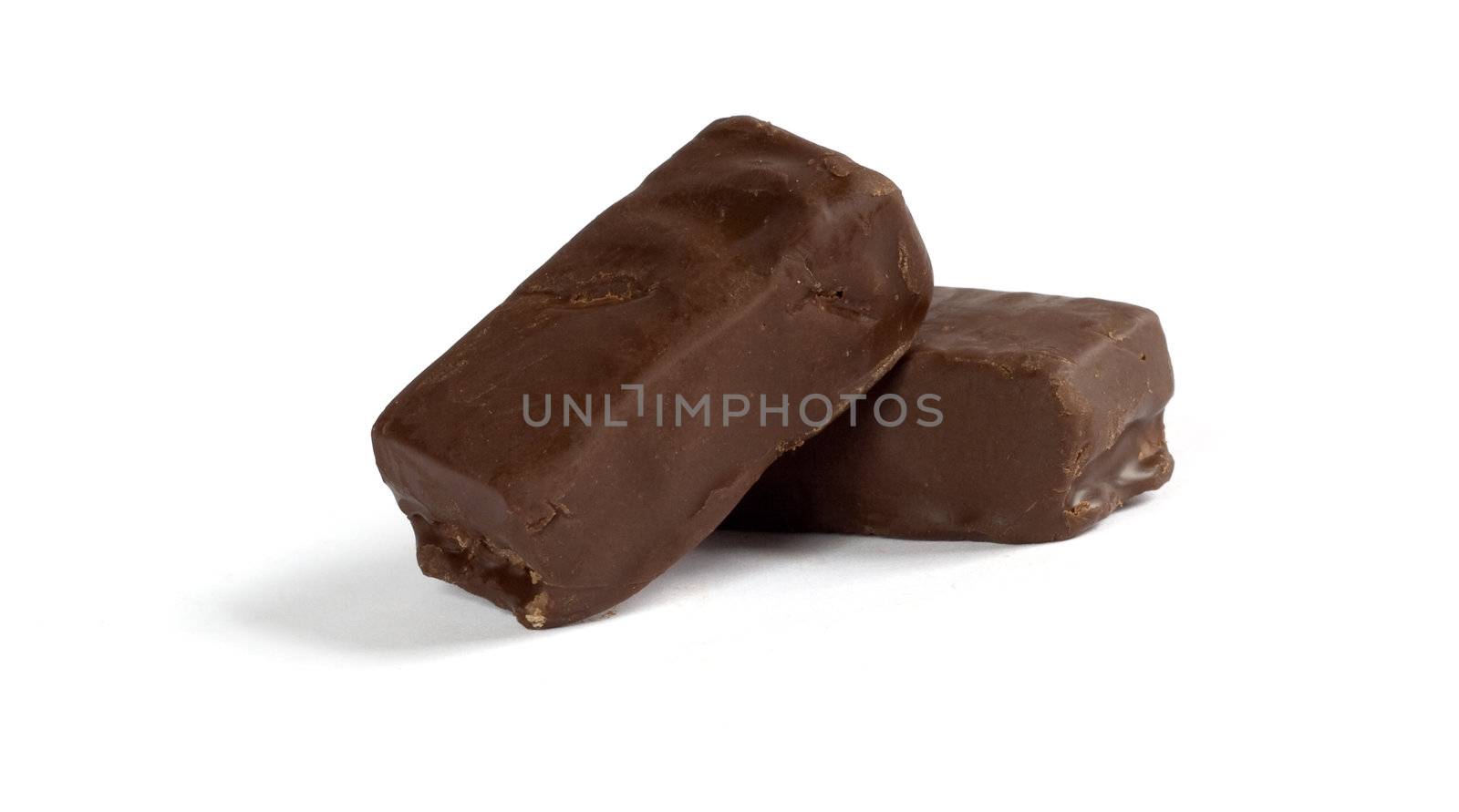 Two chocolate candies isolated on a white background with shadow. Clipping path included.