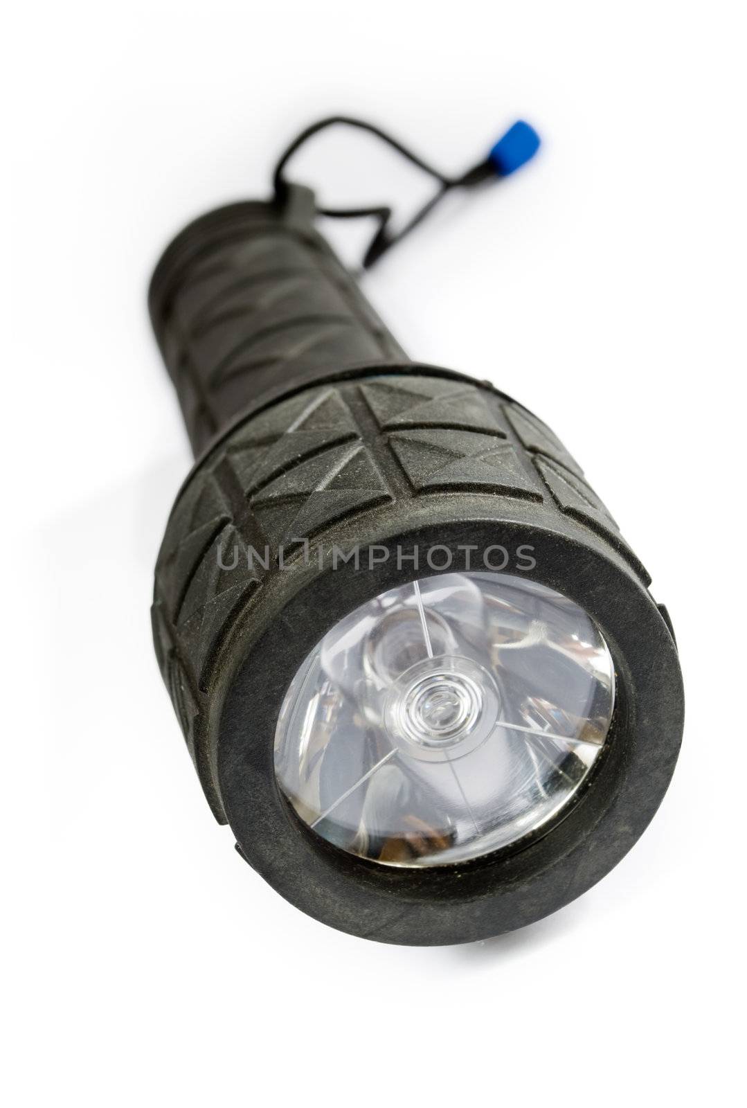 Black rubber flashlight isolated on white with shadow