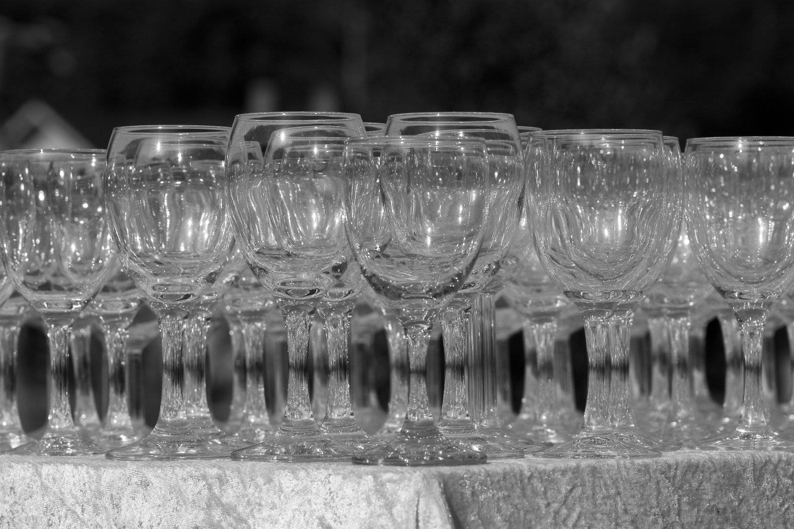 Stack of Empty champagne / wine glasses on table