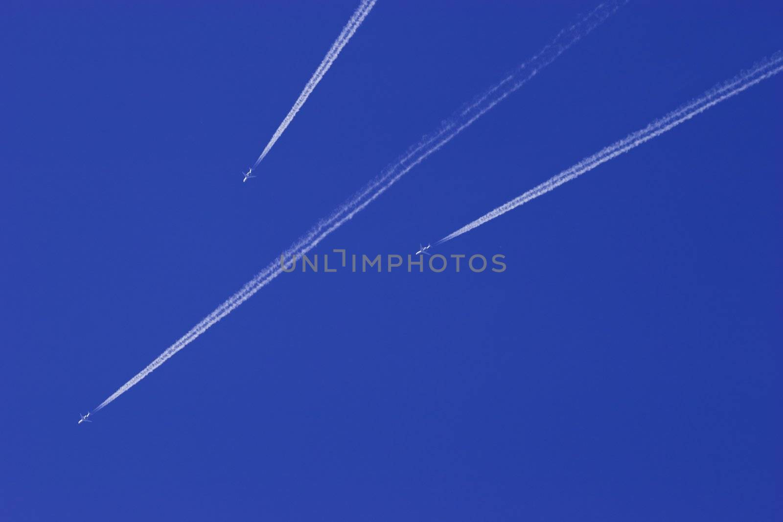 Jet airplane in blue sky by ints