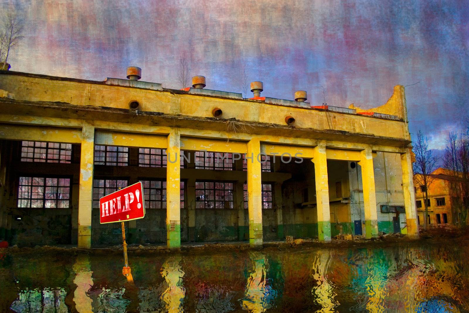 Abandoned old factory and reflection in water