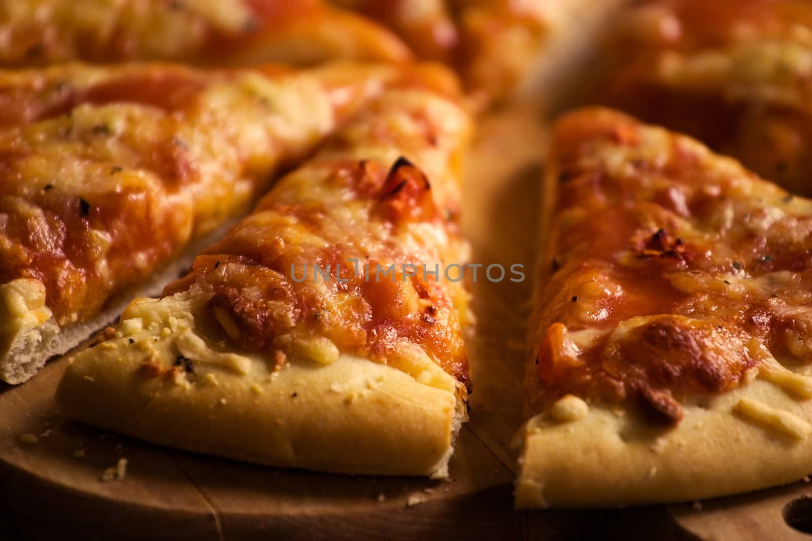 Pieces of cheese pizza by ints