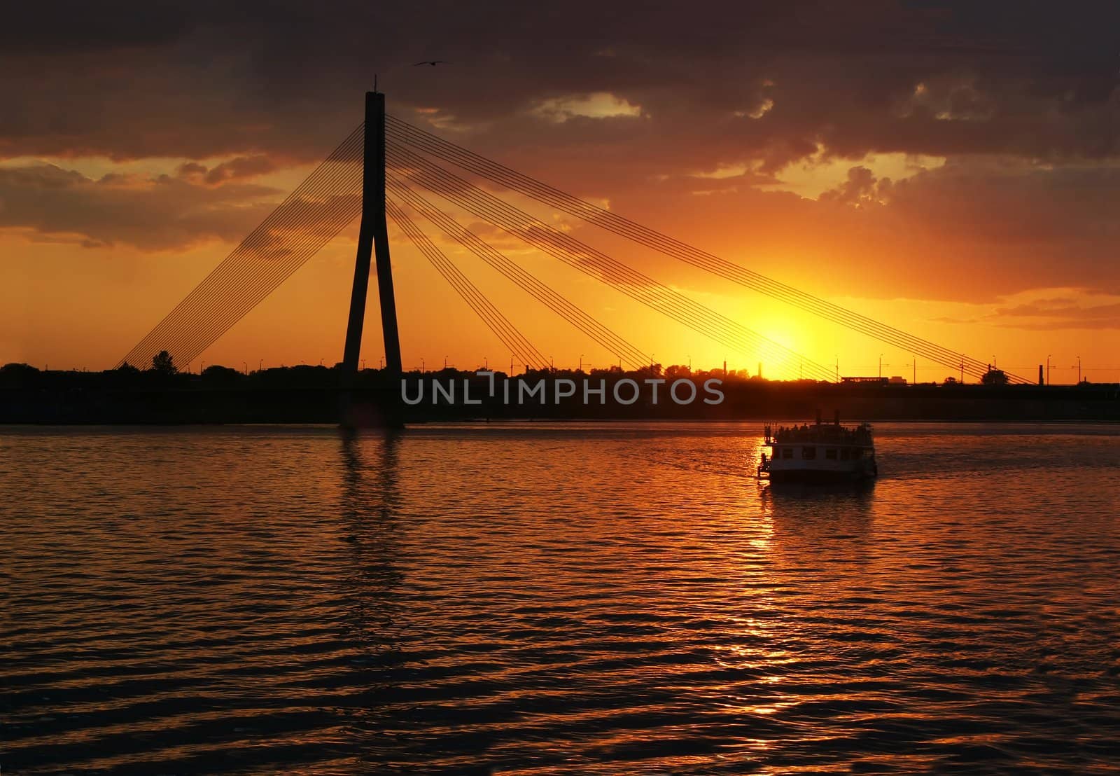 Riga suspension bridge's silhouette in sunset