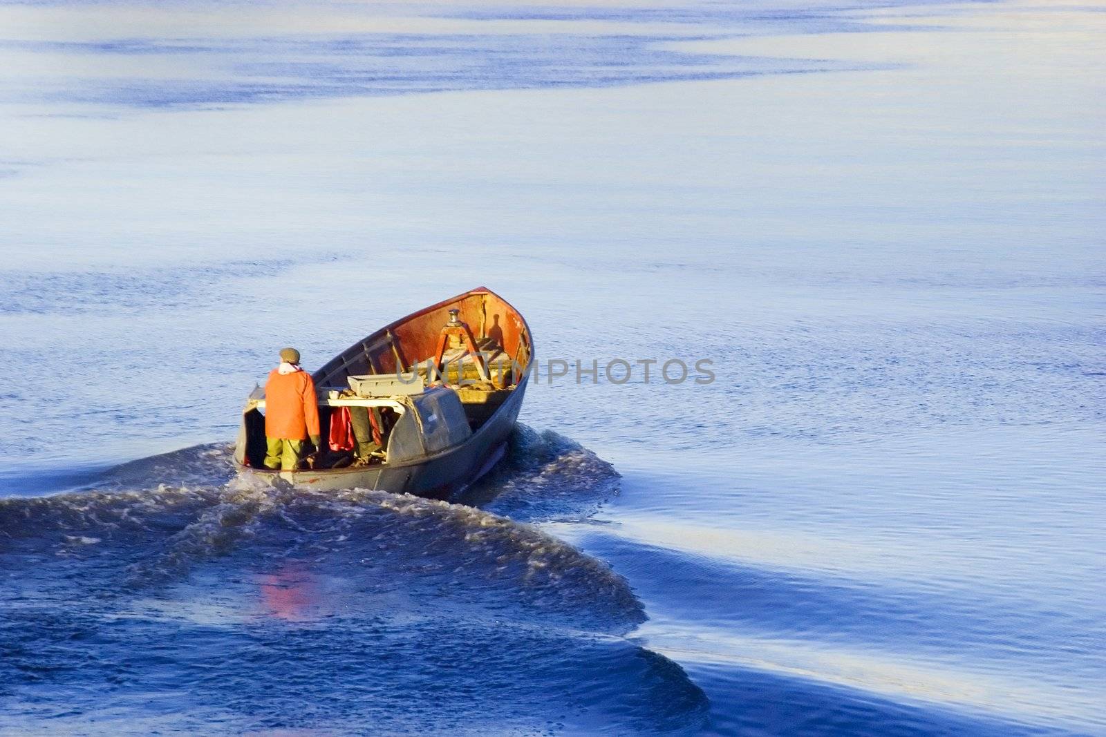 Lone Boater floating old dory