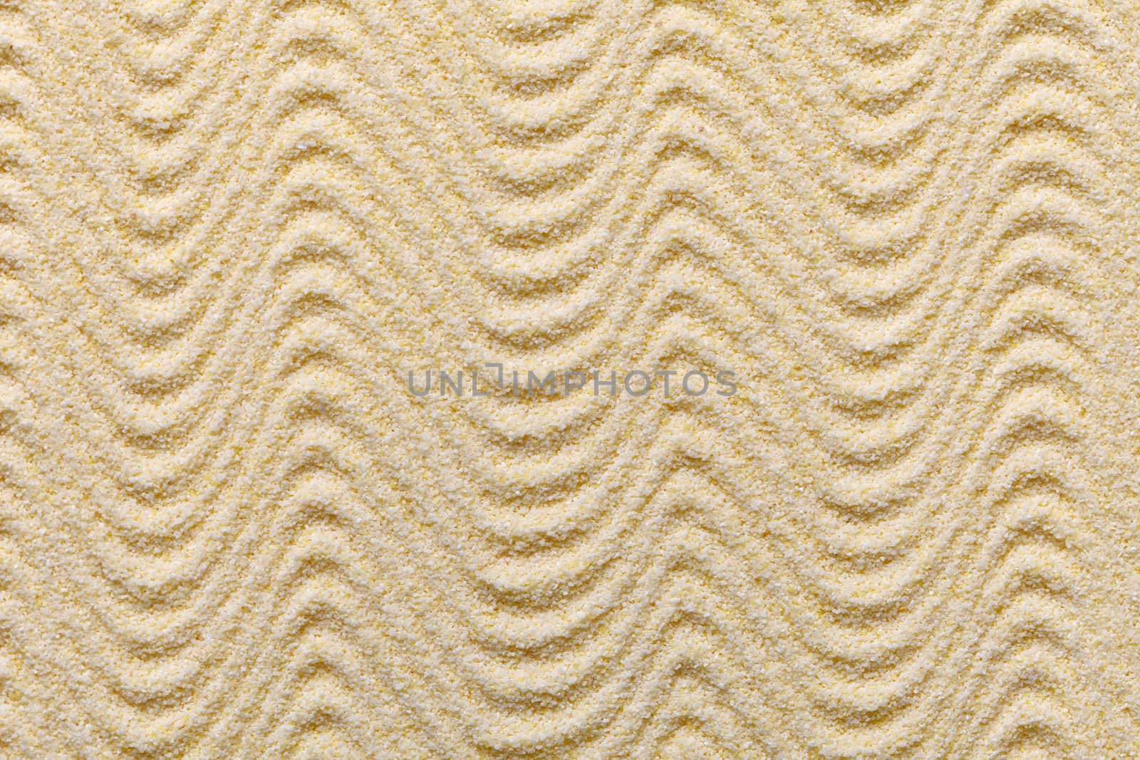 Sandy yellow decorative background with waves