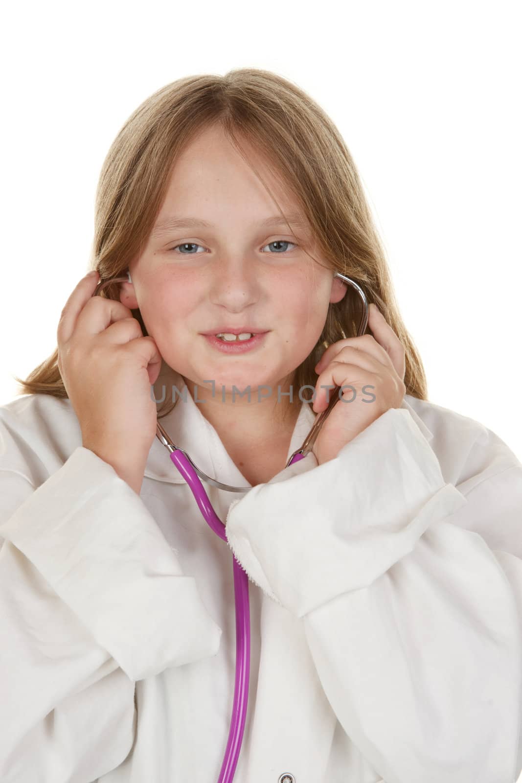young girl pretending to be a doctor by clearviewstock