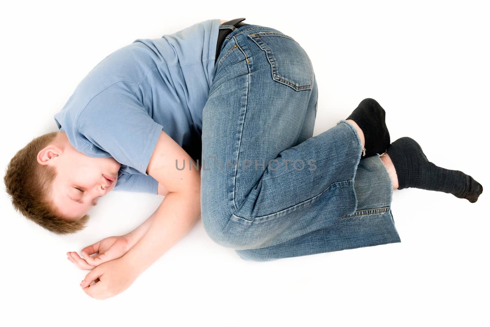 sleeping little boy on a white background