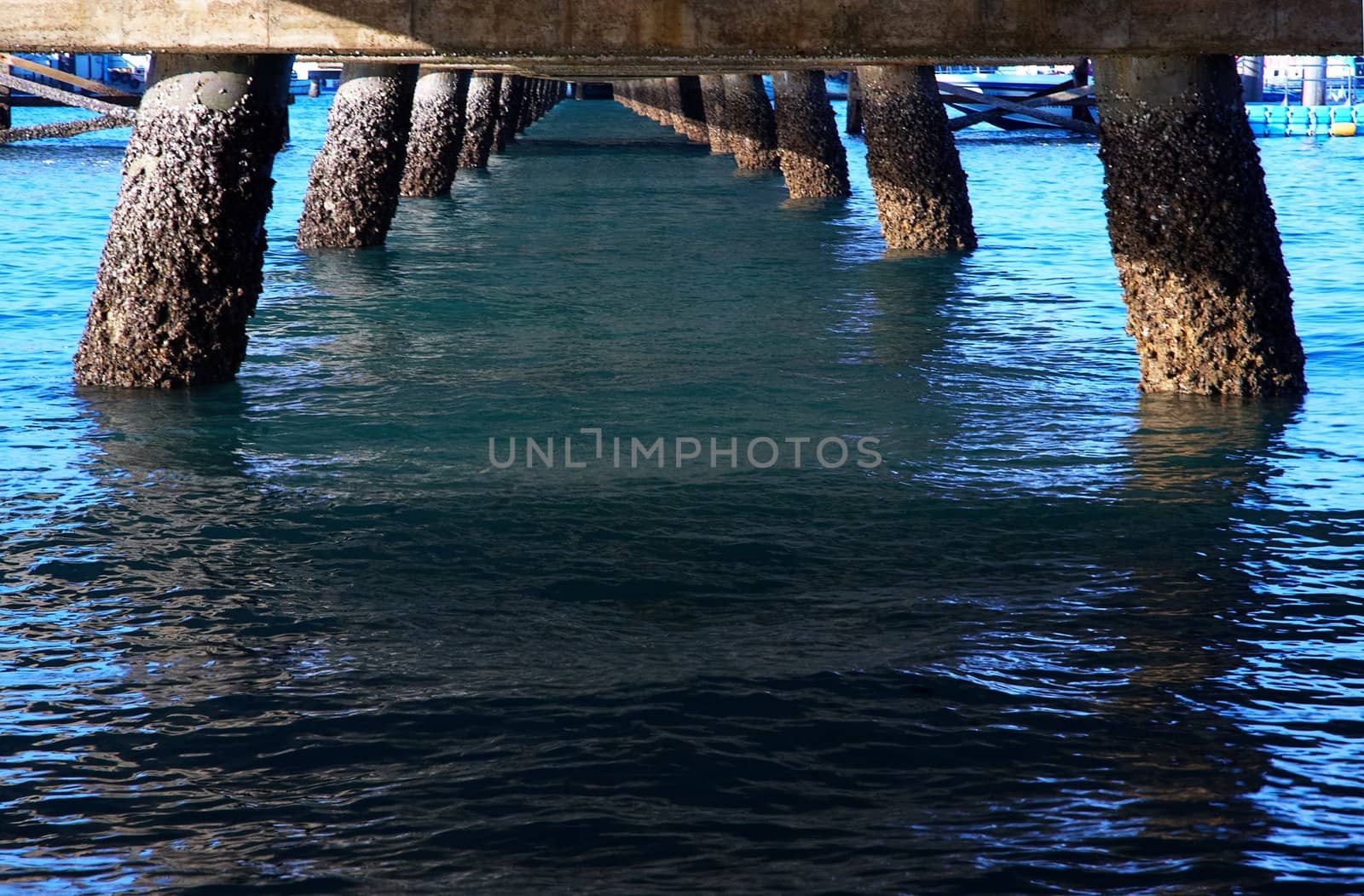 Pier, boats, buildings, beach � modern seacoast urban landscape.