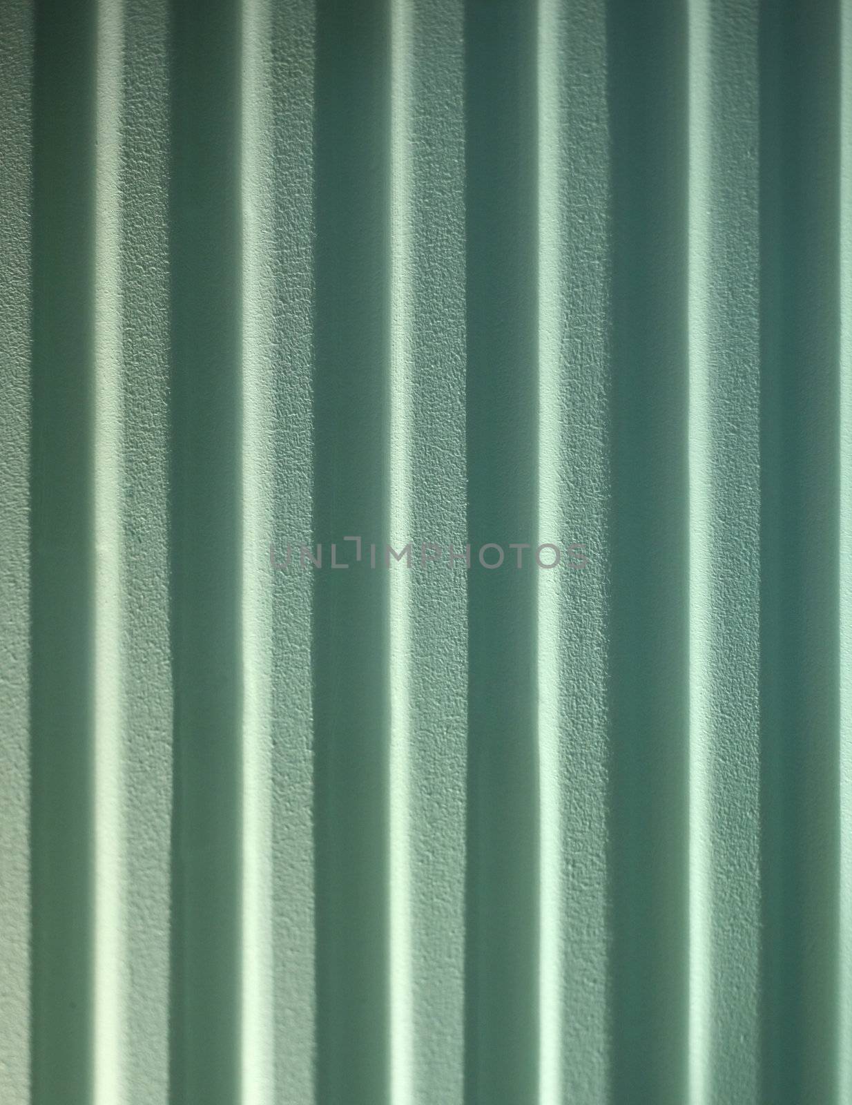 Reflecting color on green wall