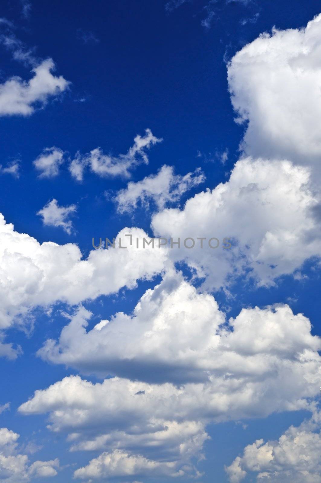 Background of blue sky with white clouds