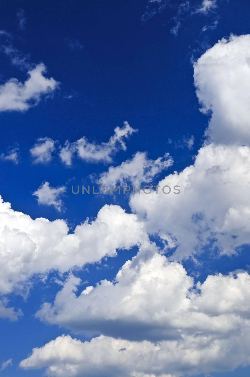 Background of blue sky with white clouds