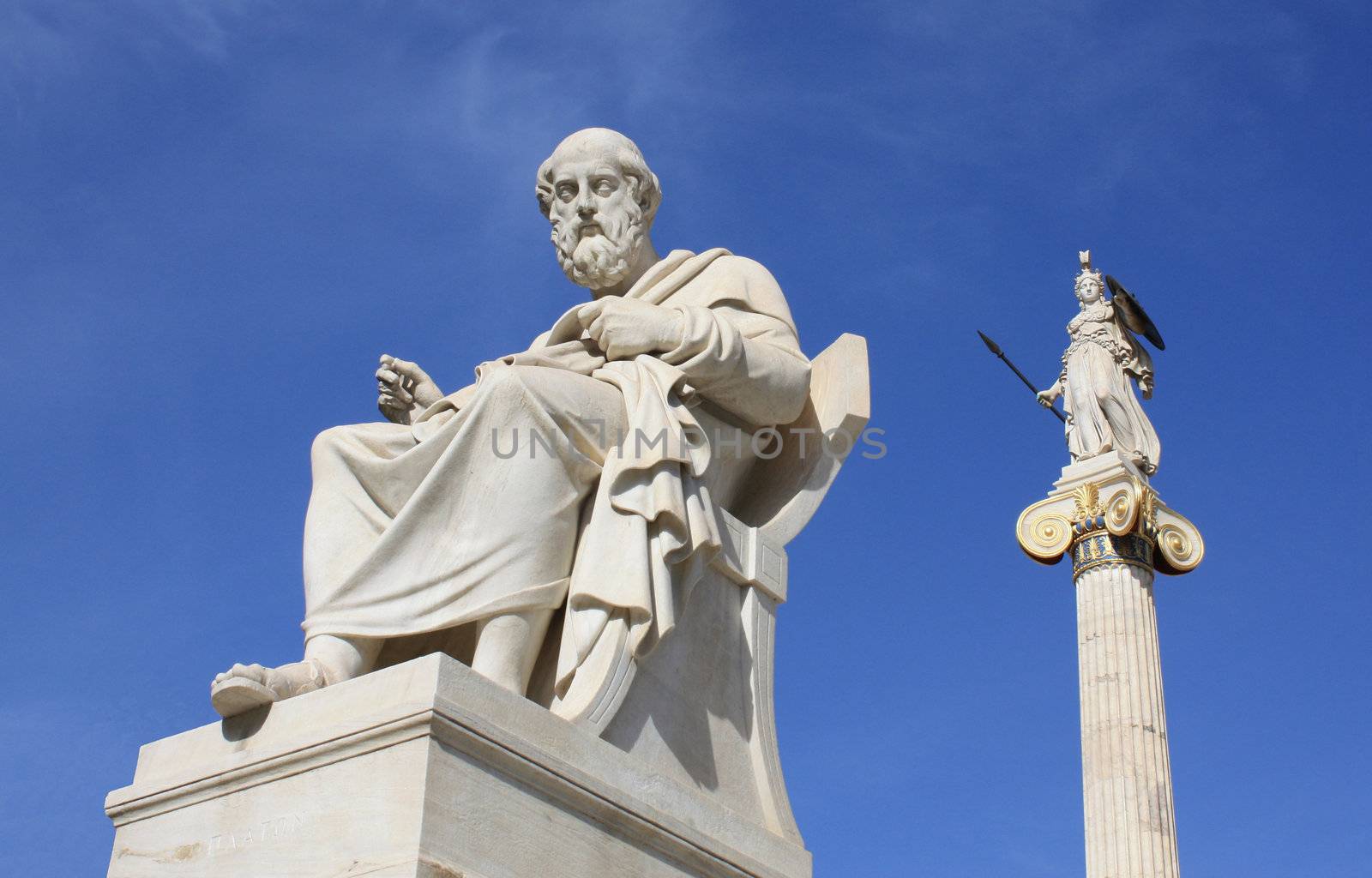 Neoclassical statues of Plato (Greek ancient philosopher) and Pallas Athena (goddess of wisdom and war) in Athens, Greece.