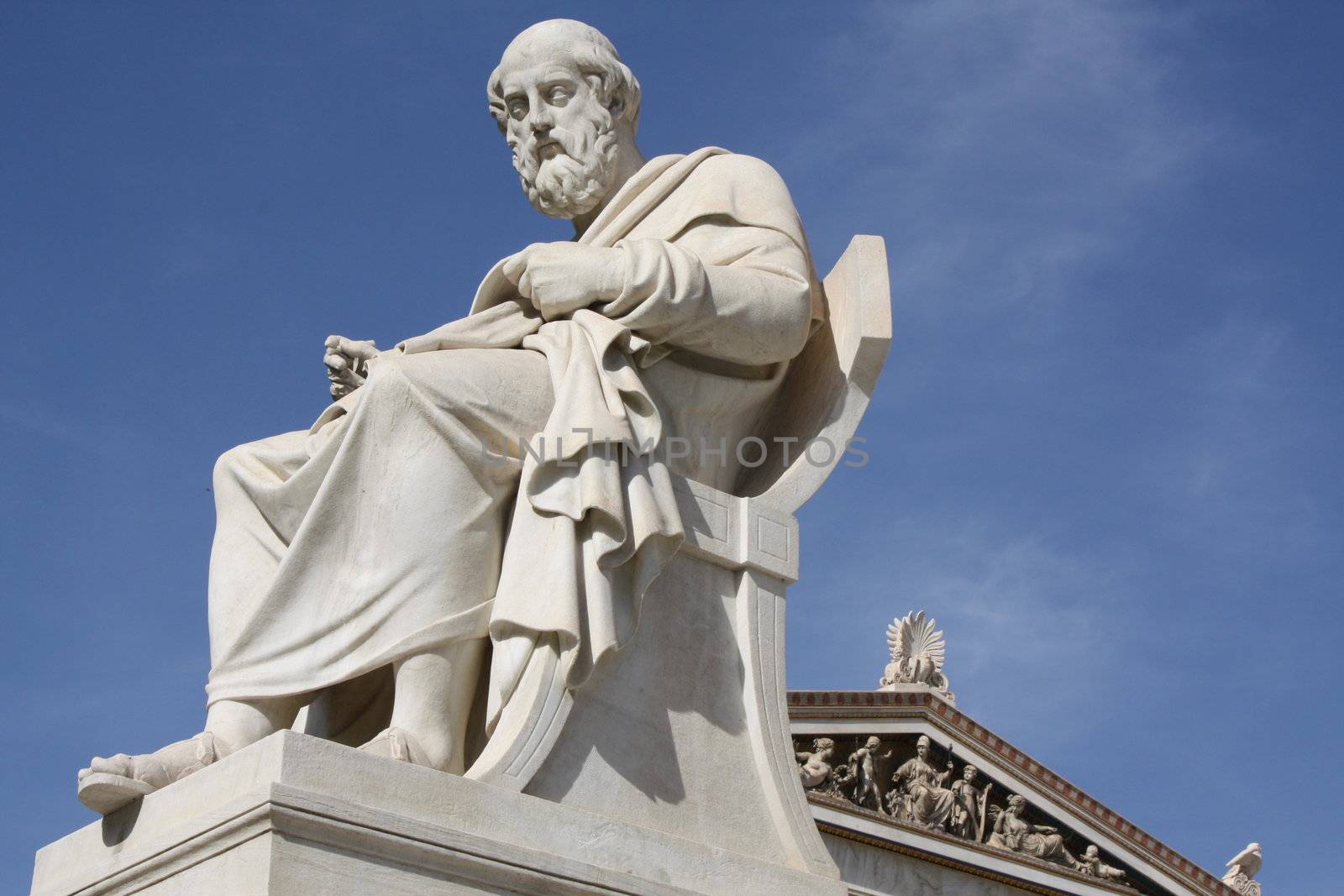 Neoclassical statue of ancient Greek philosopher, Plato, in front of the Academy of Athens in Greece.