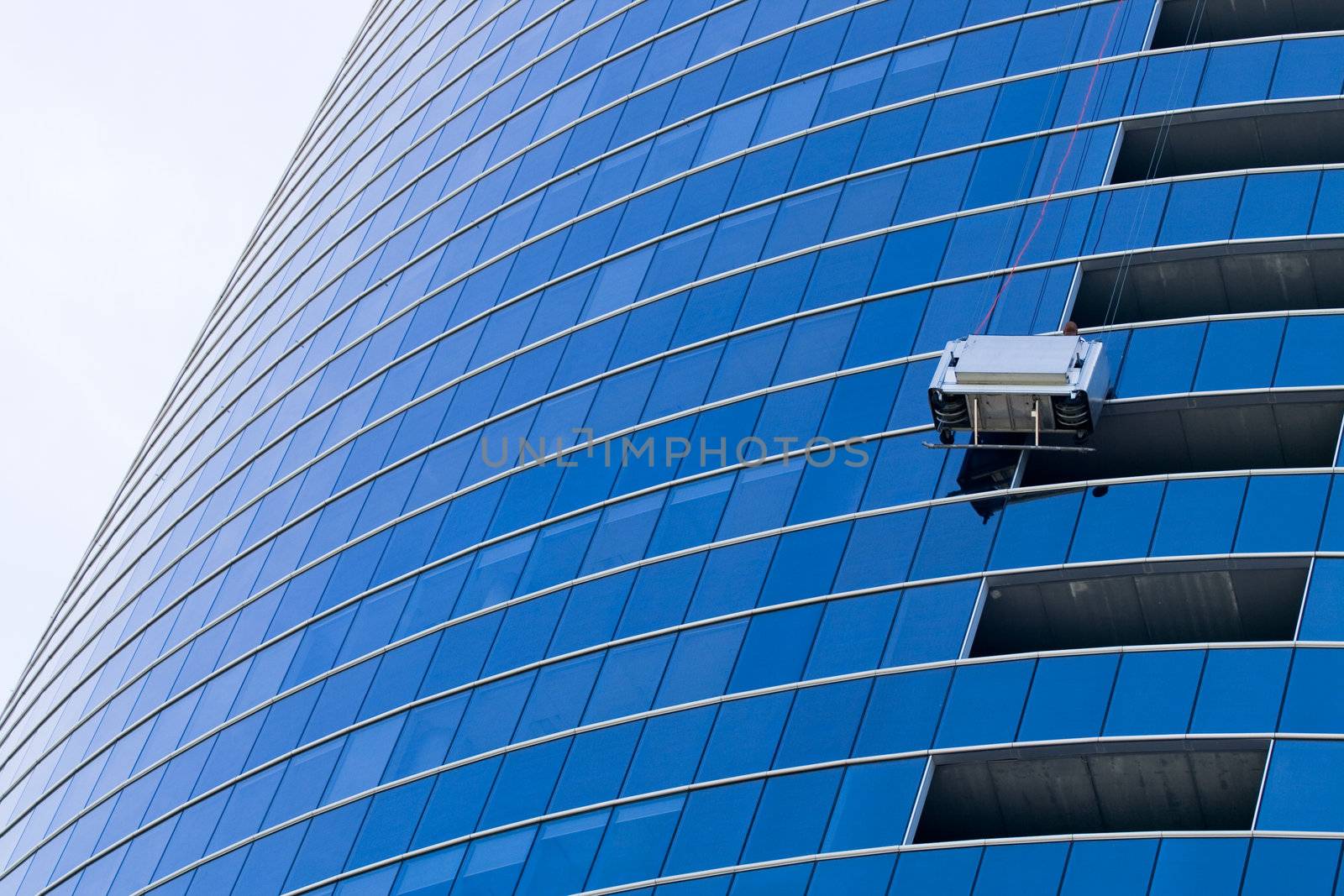 Window washer at work by ints