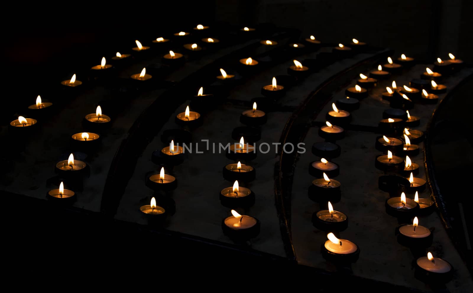 Candles in church by Brigida_Soriano