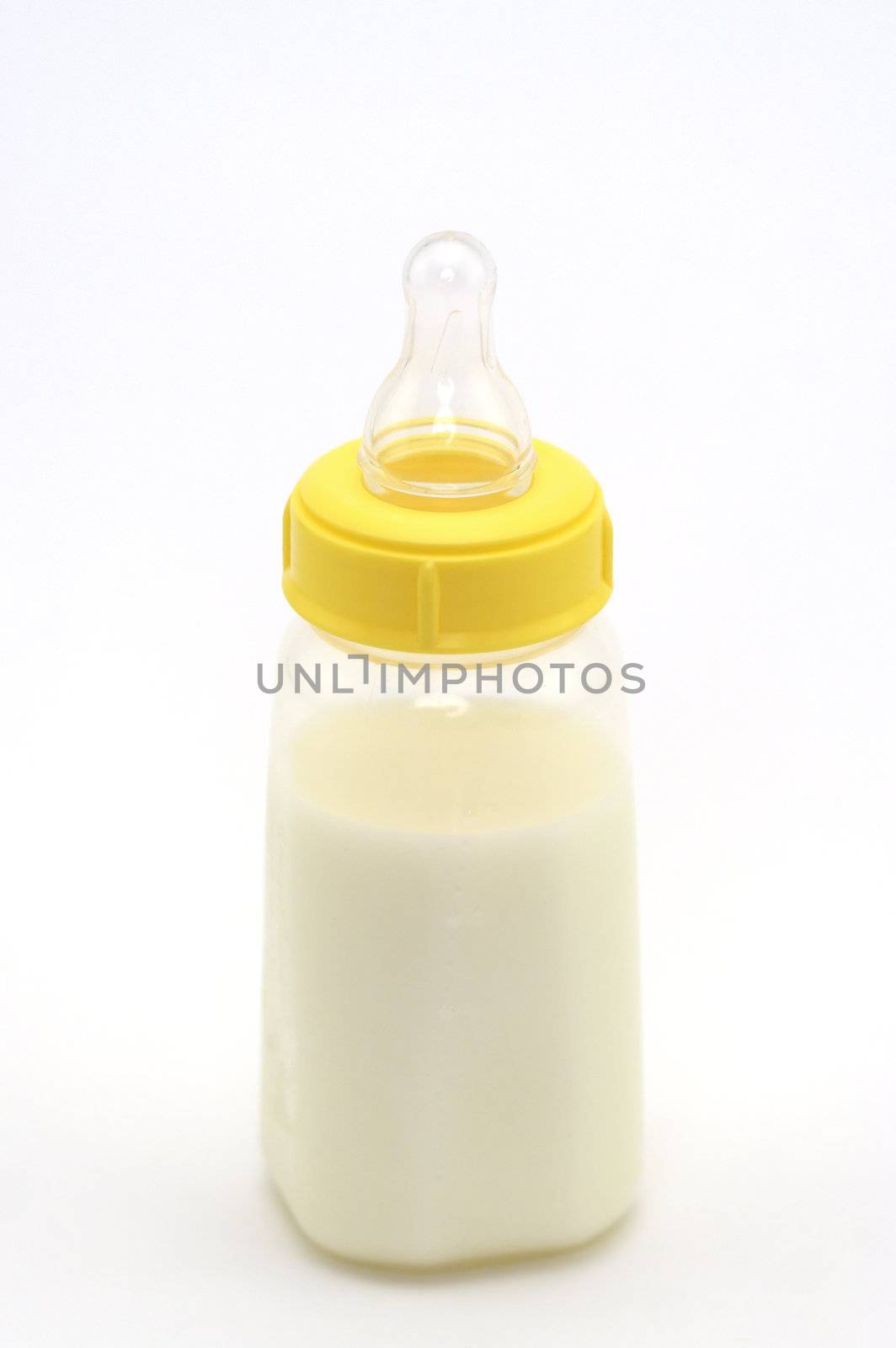 Baby bottle shot against a white background.