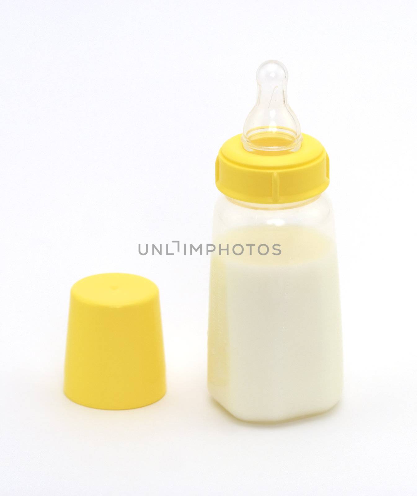 Baby bottle shot against a white background.