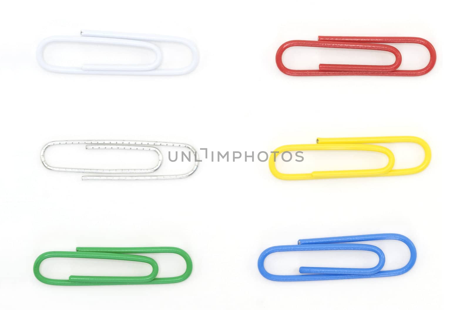 A variety of paperclips shot against a white background.