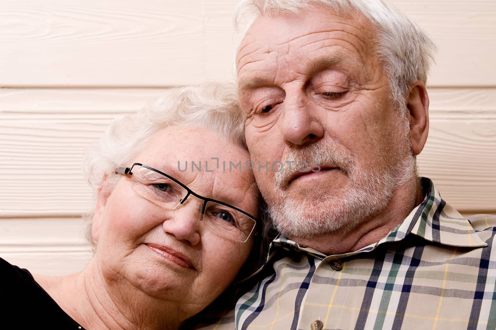 portrait of an elderly couple enjoying each others company