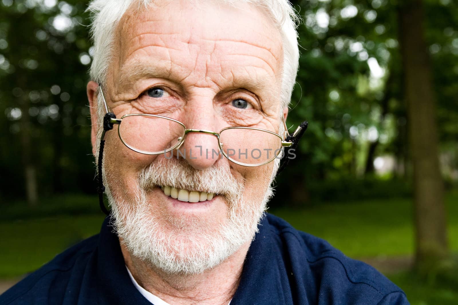 outside portrait of an elderly man laughing